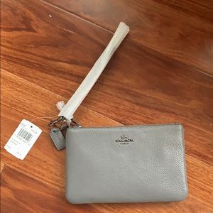 Brand new grey coach wristlet